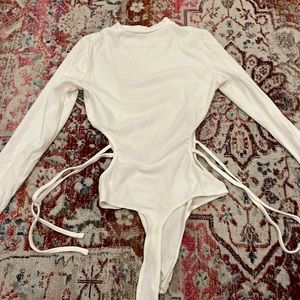 White Long Sleeve Bodysuit with Hips Exposed